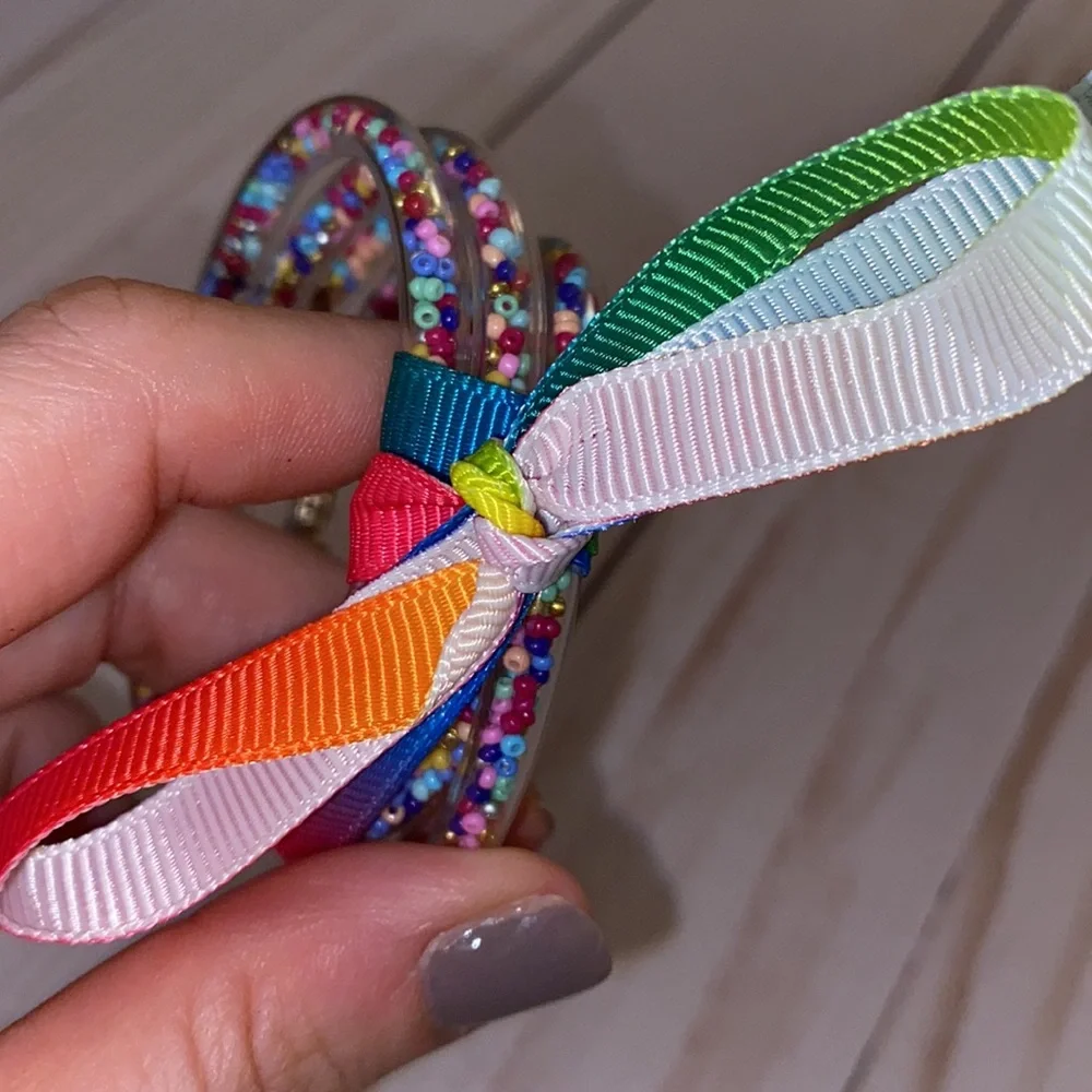 Little girls clear rubber rainbow confetti bracelets
